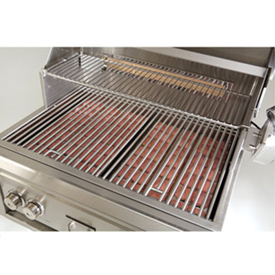 Stainless steel grill with open lid on a white background